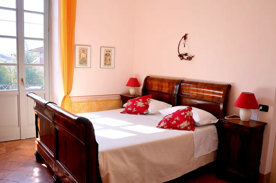 The walnut sleigh beds in the Palazzo apartment
