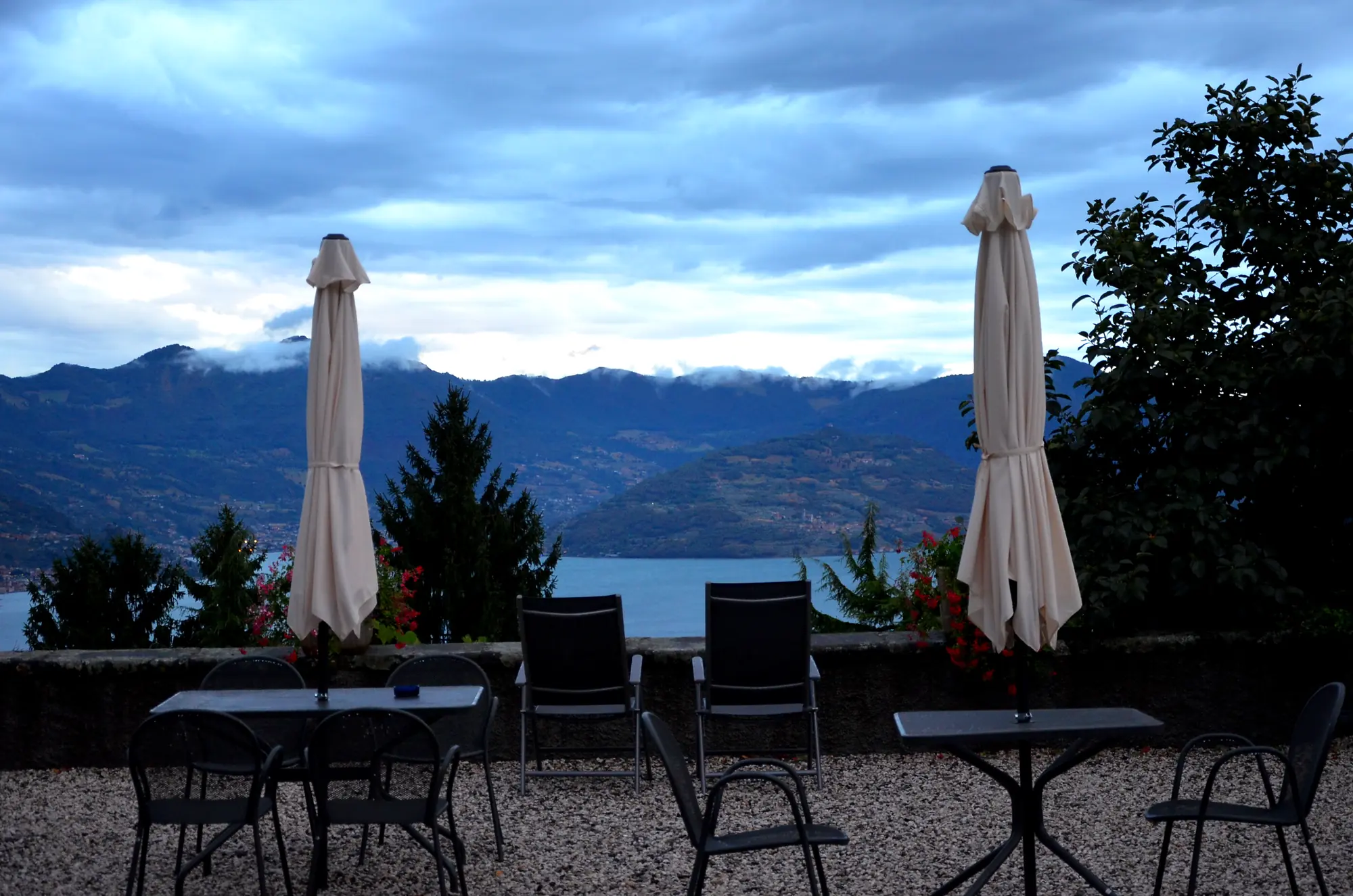 The sun terrace at dusk, with the parasols closed
